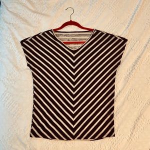 Black and beige stripe woman’s top.